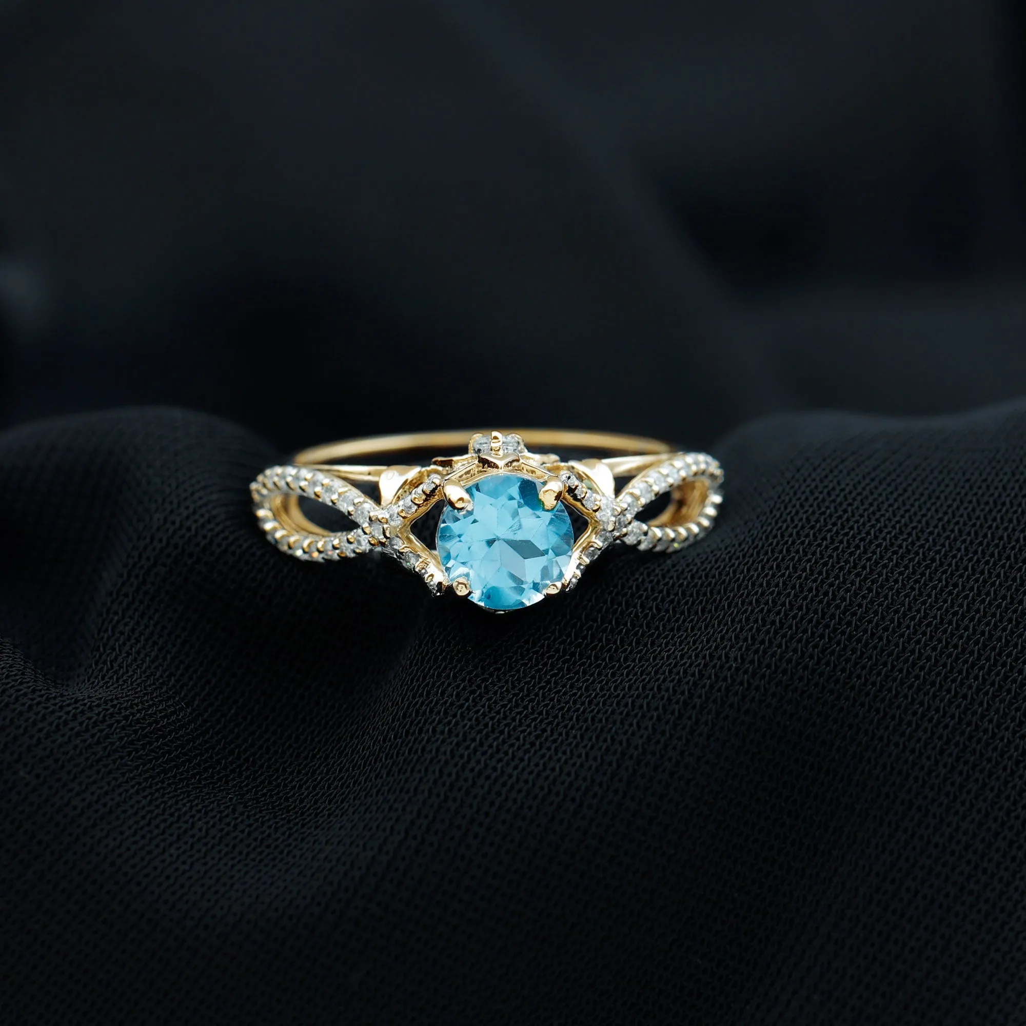 Designer Swiss Blue Topaz and Diamond Crossover Engagement Ring