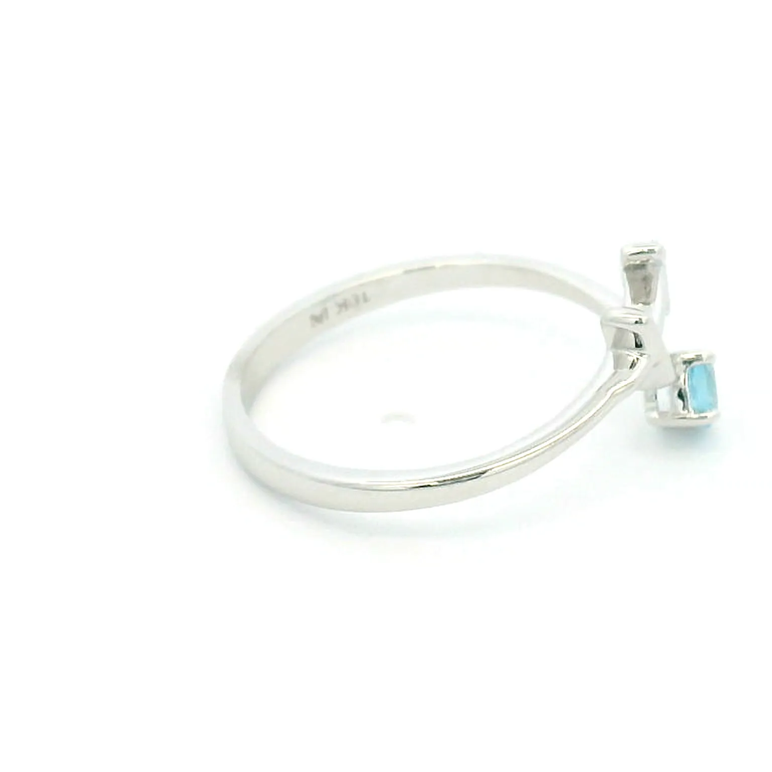 Elegant White Gold Sagittarius Ring with Blue Topaz