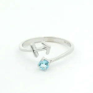 Elegant White Gold Sagittarius Ring with Blue Topaz