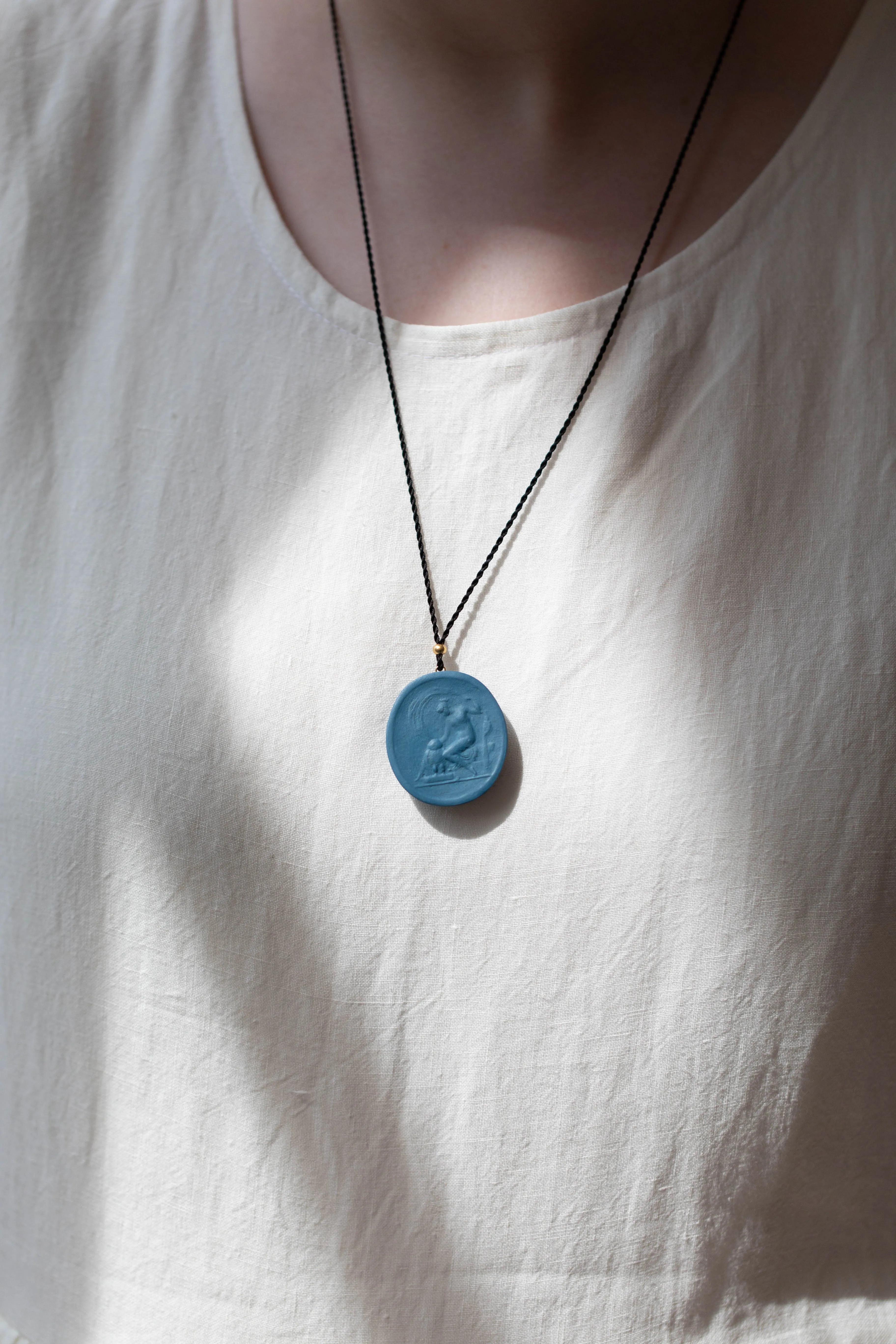 Marcie McGoldrick | Porcelain Cameo Pendant- Athena in Indigo