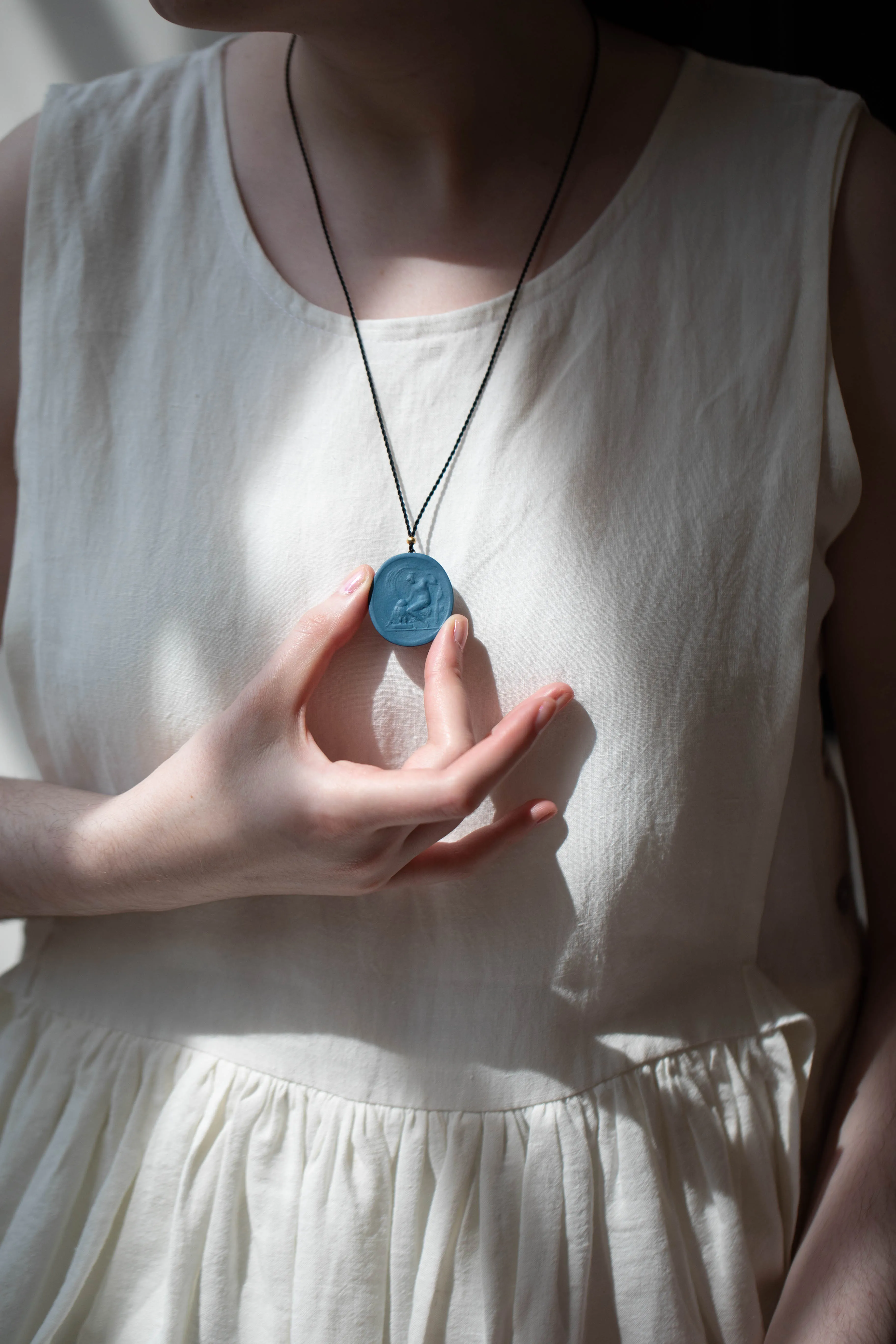 Marcie McGoldrick | Porcelain Cameo Pendant- Athena in Indigo