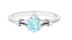 Pear Shape Sky Blue Topaz Solitaire Ring with Diamond in Split Shank